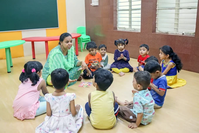 Teacher leading circle story time with children