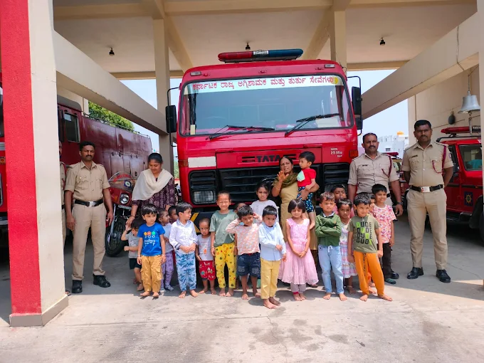 Children visiting local fire station on field trip