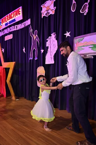 Girl in costume dancing on Annual Day stage