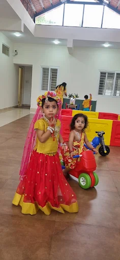 Girls dressed in traditional festive attire