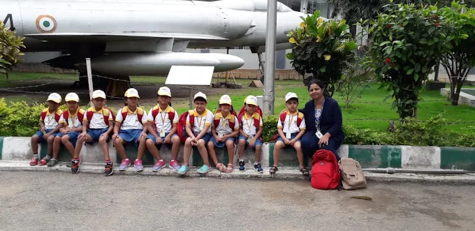 Children visiting an aircraft museum on field trip