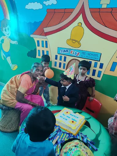 Birthday celebration with cake and family